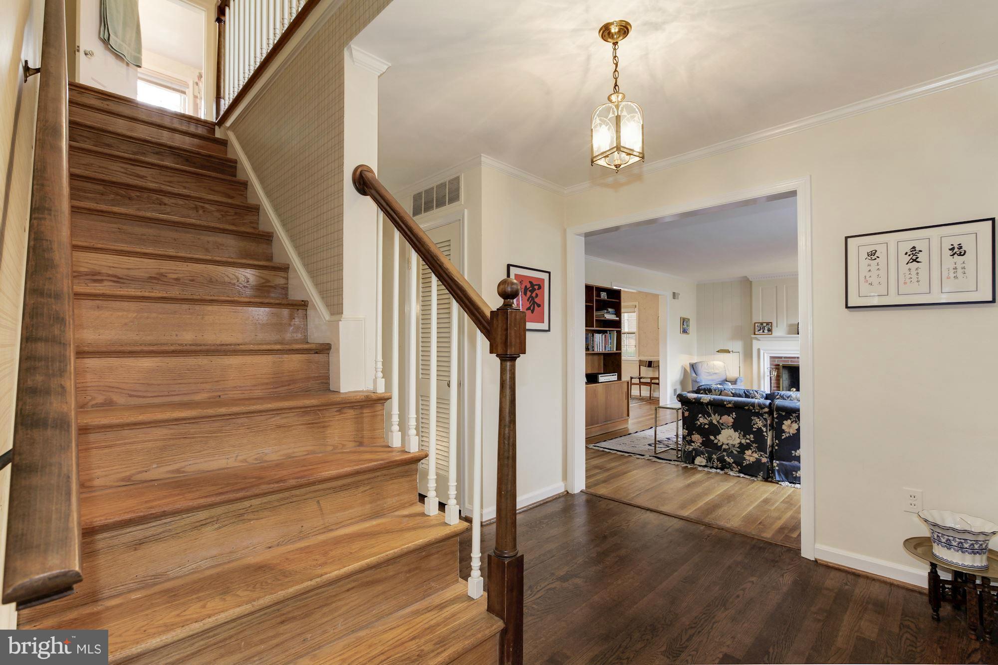 5502 Pollard Road Bethesda, MD 20816 - Photo 4 of 30 a view of entryway and hall with wooden floor
