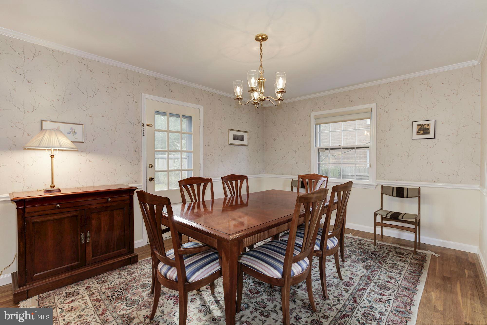 5502 Pollard Road Bethesda, MD 20816 - Photo 7 of 30 a view of a dining room with furniture