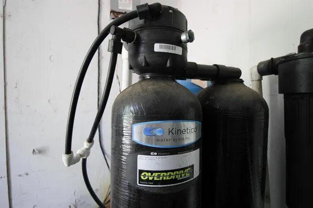 a living room with furniture and entryway