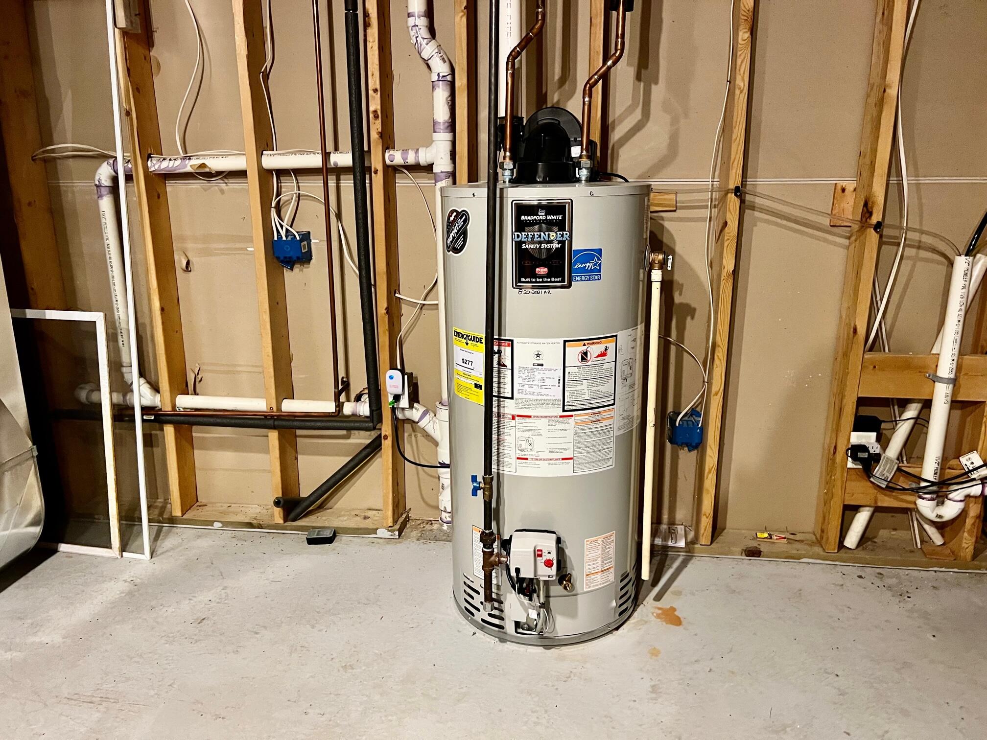 6220 Cat Road Twin Lake, MI 49457 - Photo 39 of 42 Water heater