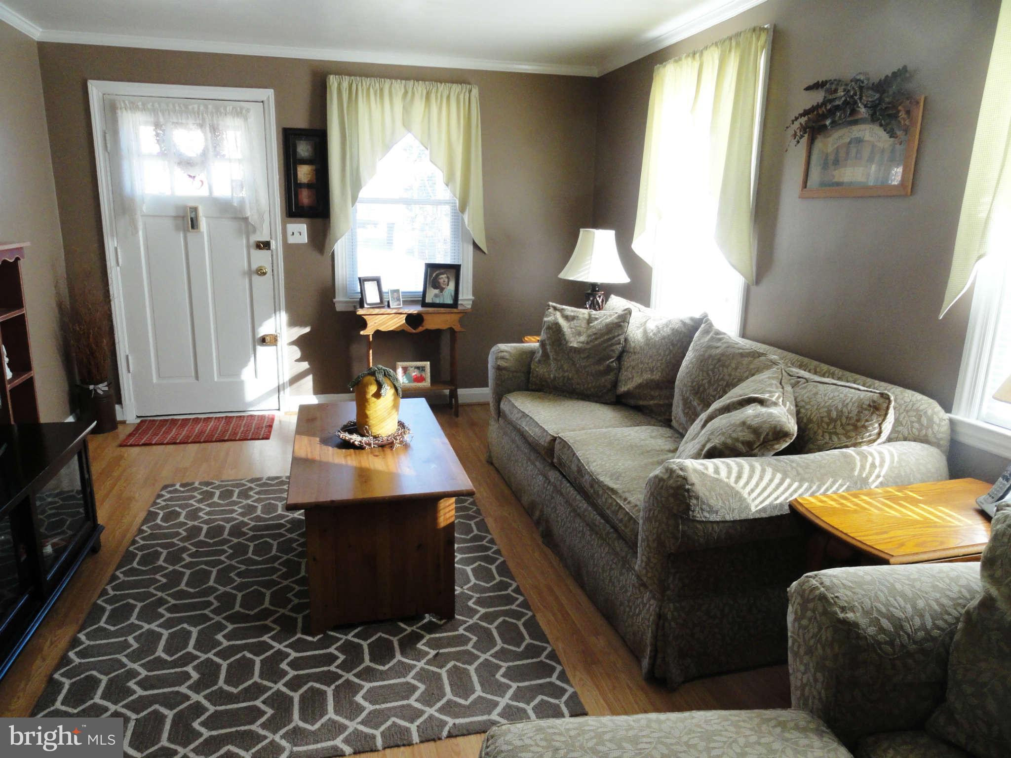 7914 Hillendale Road Baltimore, MD 21234 - Photo 3 of 18 Living Room with Front Door