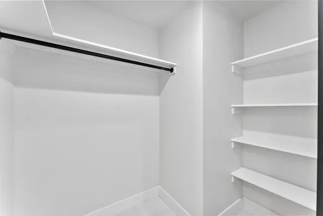 a view of a backyard with sitting area