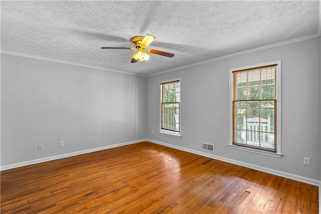 894 Upper Woolsey Road Hampton, GA 30228 - Photo 11 of 96 an empty room with a window