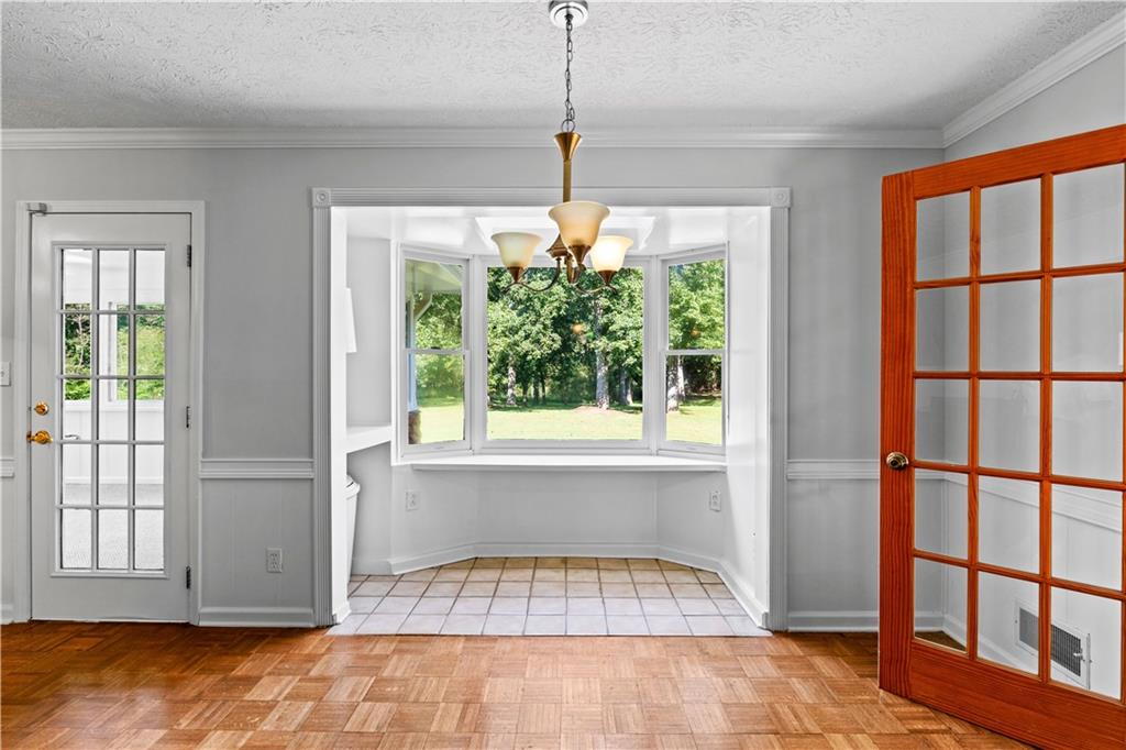 894 Upper Woolsey Road Hampton, GA 30228 - Photo 27 of 96 a living room with a large window and pool table