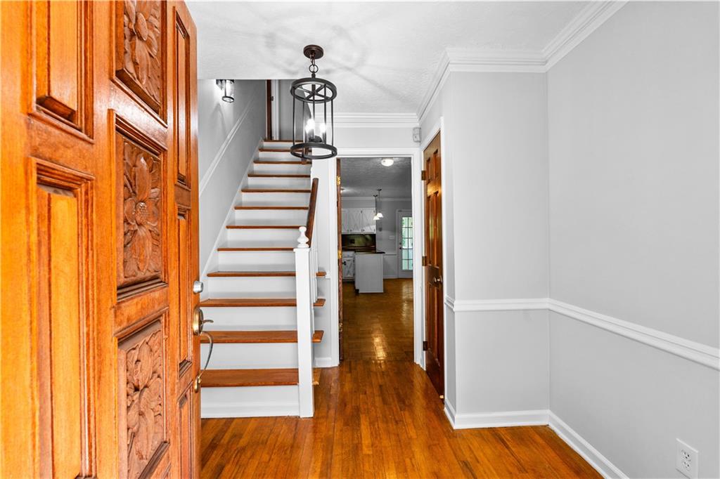 894 Upper Woolsey Road Hampton, GA 30228 - Photo 6 of 96 a view of entryway with wooden floor