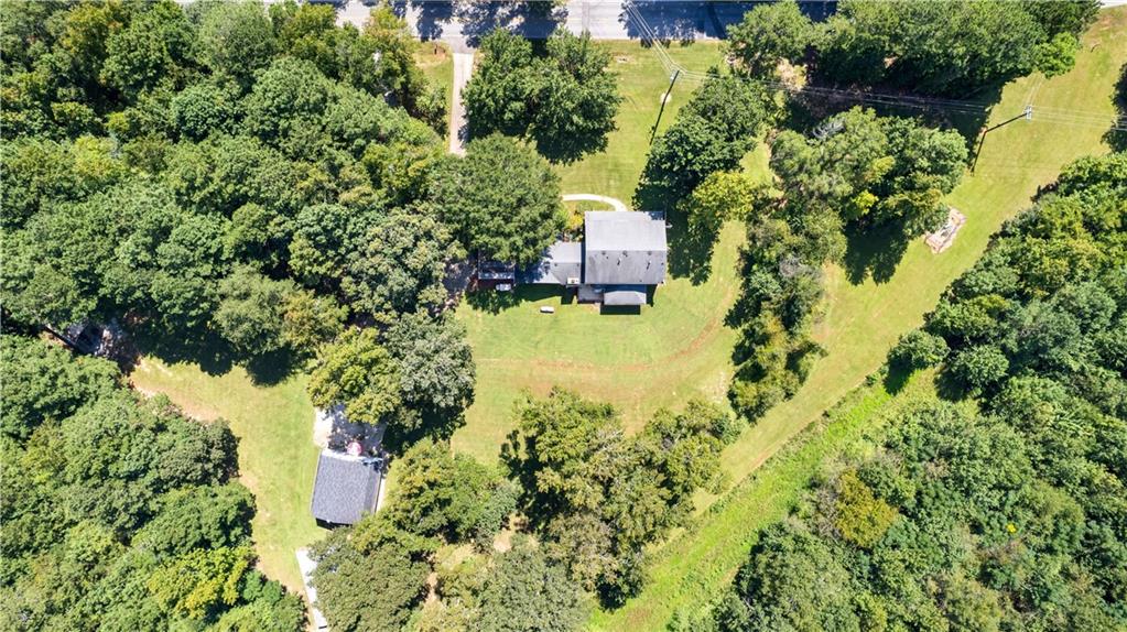 894 Upper Woolsey Road Hampton, GA 30228 - Photo 68 of 96 an aerial view of residential house with outdoor space and trees all around