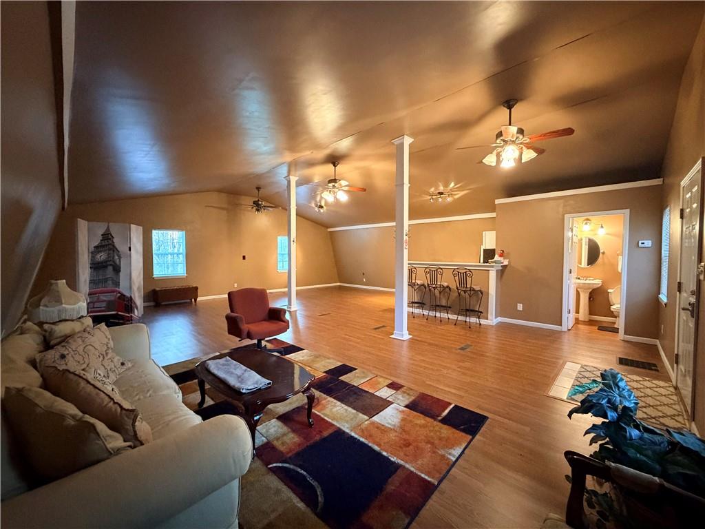 894 Upper Woolsey Road Hampton, GA 30228 - Photo 92 of 96 a living room with furniture and a flat screen tv