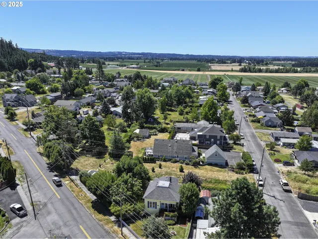 an aerial view of a city with lots of residential buildings