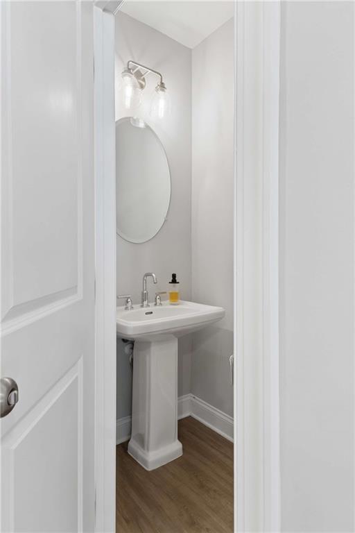 1324 Parc Bench Road Atlanta, GA 30316 - Photo 19 of 35 a bathroom with a sink and mirror