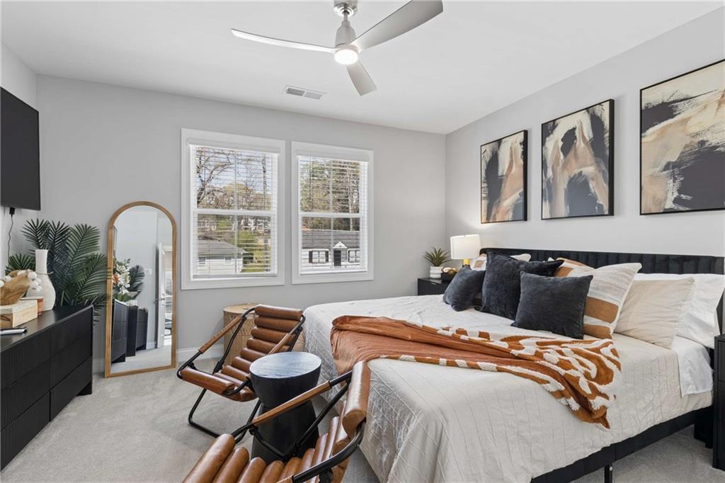 1324 Parc Bench Road Atlanta, GA 30316 - Photo 26 of 35 a bedroom with two beds and a large window