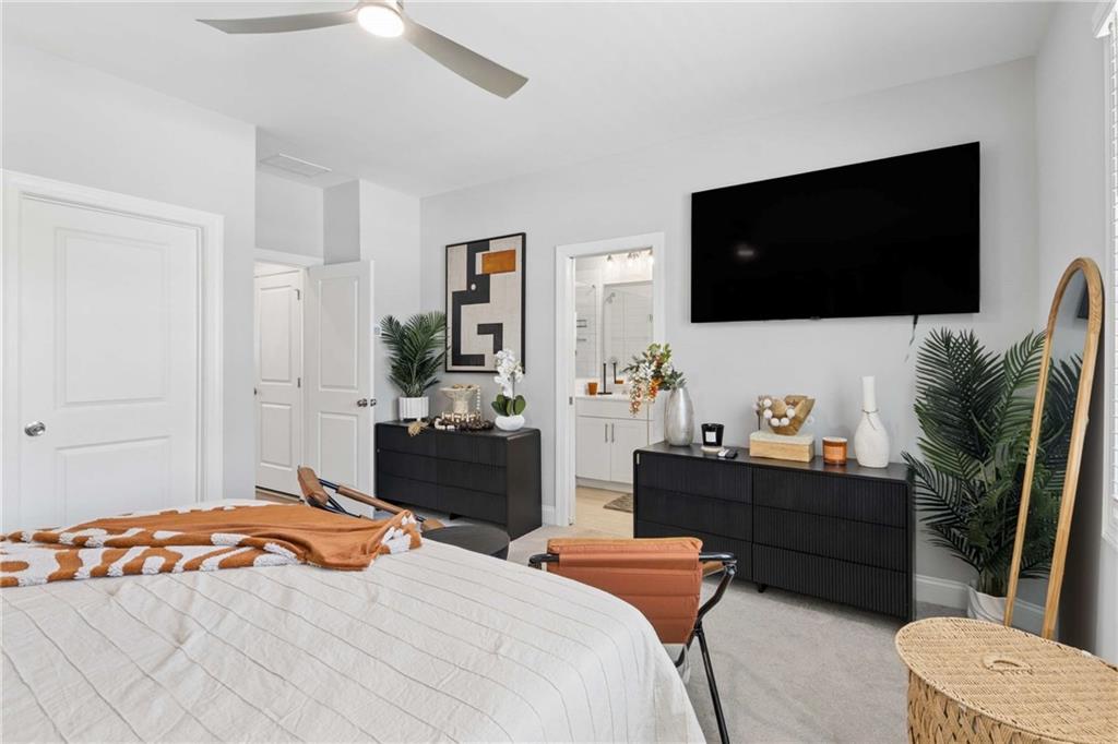 1324 Parc Bench Road Atlanta, GA 30316 - Photo 27 of 35 a bedroom with a bed and flat screen tv