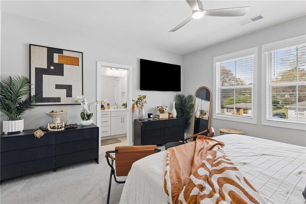 1324 Parc Bench Road Atlanta, GA 30316 - Photo 28 of 35 a bedroom with a bed and a flat screen tv