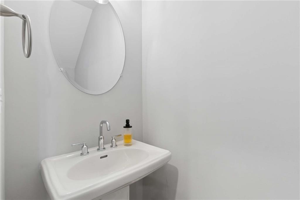 1324 Parc Bench Road Atlanta, GA 30316 - Photo 31 of 35 a bathroom with a sink and a mirror