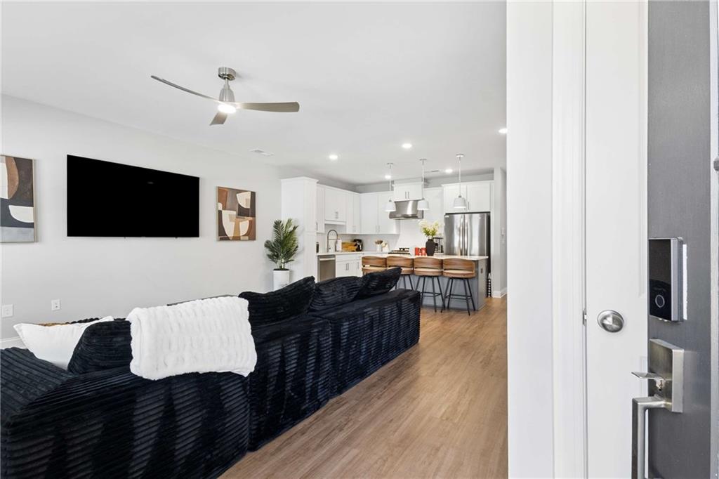 1324 Parc Bench Road Atlanta, GA 30316 - Photo 5 of 35 a living room with furniture and a flat screen tv