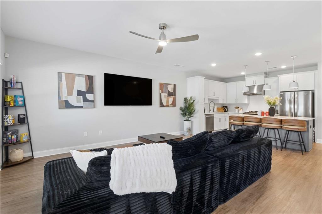 1324 Parc Bench Road Atlanta, GA 30316 - Photo 6 of 35 a living room with furniture and a flat screen tv
