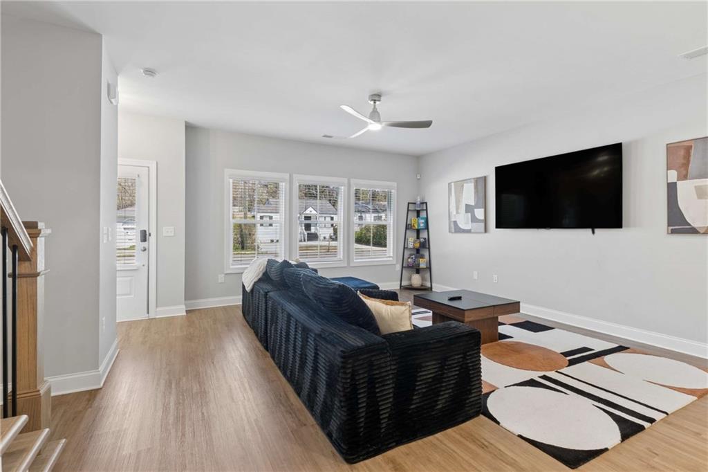 1324 Parc Bench Road Atlanta, GA 30316 - Photo 9 of 35 a living room with furniture and a flat screen tv