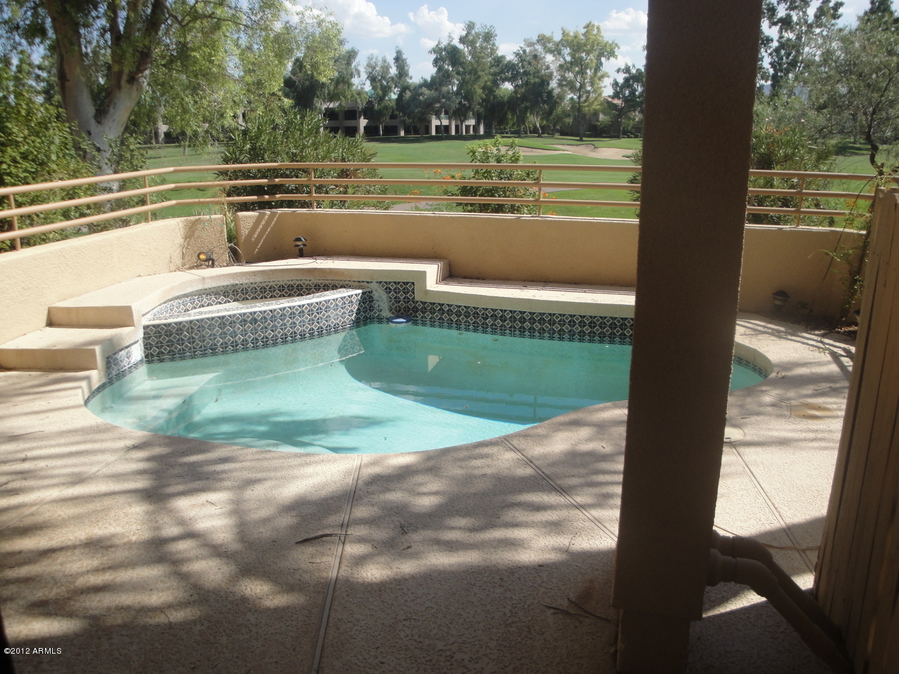7760 East Gainey Ranch Road, Unit 10 Scottsdale, AZ 85258 - Photo 4 of 17 Sit In Pool in Back yard
