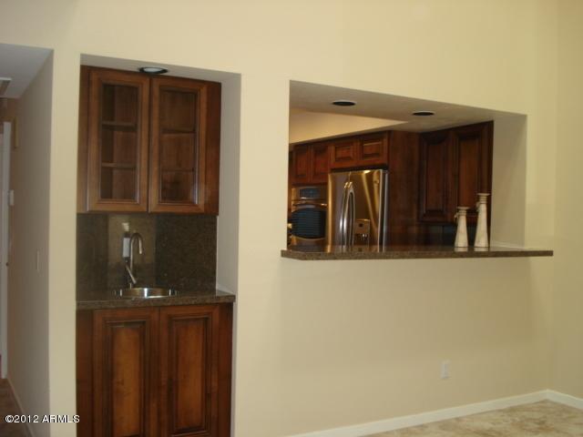 7760 East Gainey Ranch Road, Unit 10 Scottsdale, AZ 85258 - Photo 8 of 17 Bar Sink In Dining Room