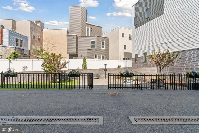 a view of a chairs and table in patio
