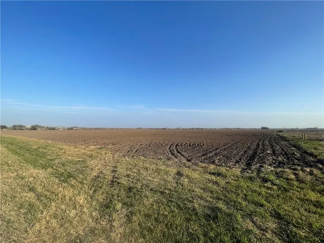 a view of a wooden fence and lake view
