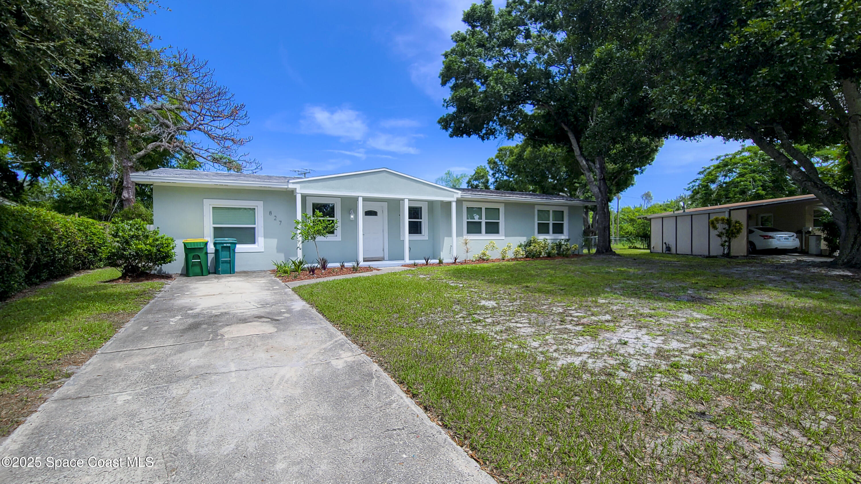 827 Glenmore Circle Melbourne, FL 32901 - Photo 2 of 30 a view of a house with a yard