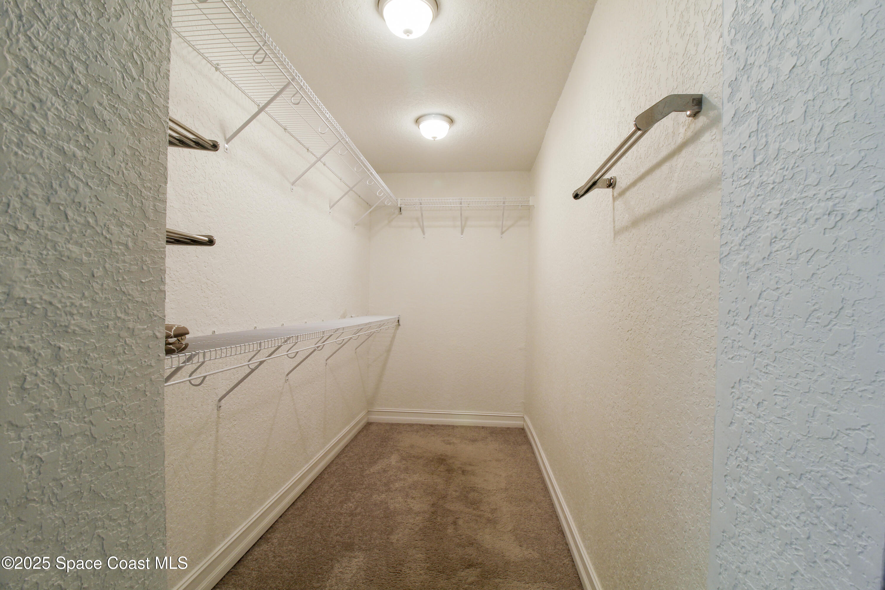 827 Glenmore Circle Melbourne, FL 32901 - Photo 23 of 30 a view of a walk in closet