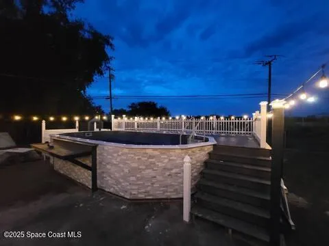 a view of a balcony with an outdoor space
