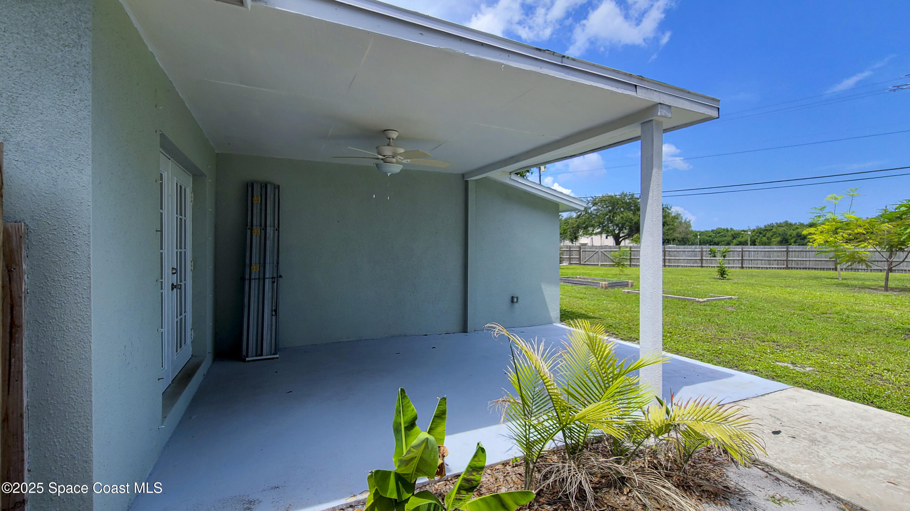827 Glenmore Circle Melbourne, FL 32901 - Photo 29 of 30 a view of a house with backyard and sitting area
