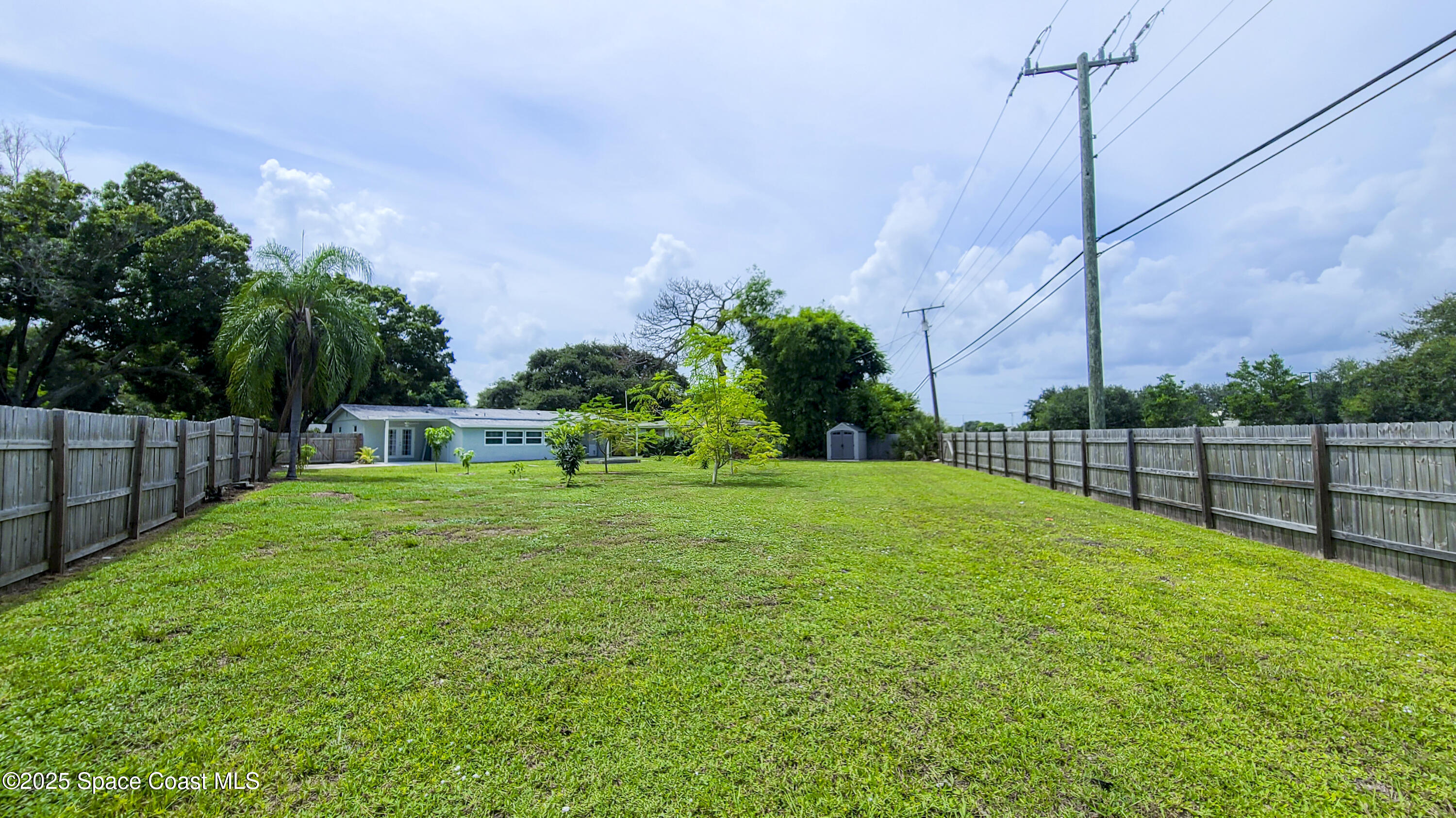 827 Glenmore Circle Melbourne, FL 32901 - Photo 30 of 30 a view of a backyard