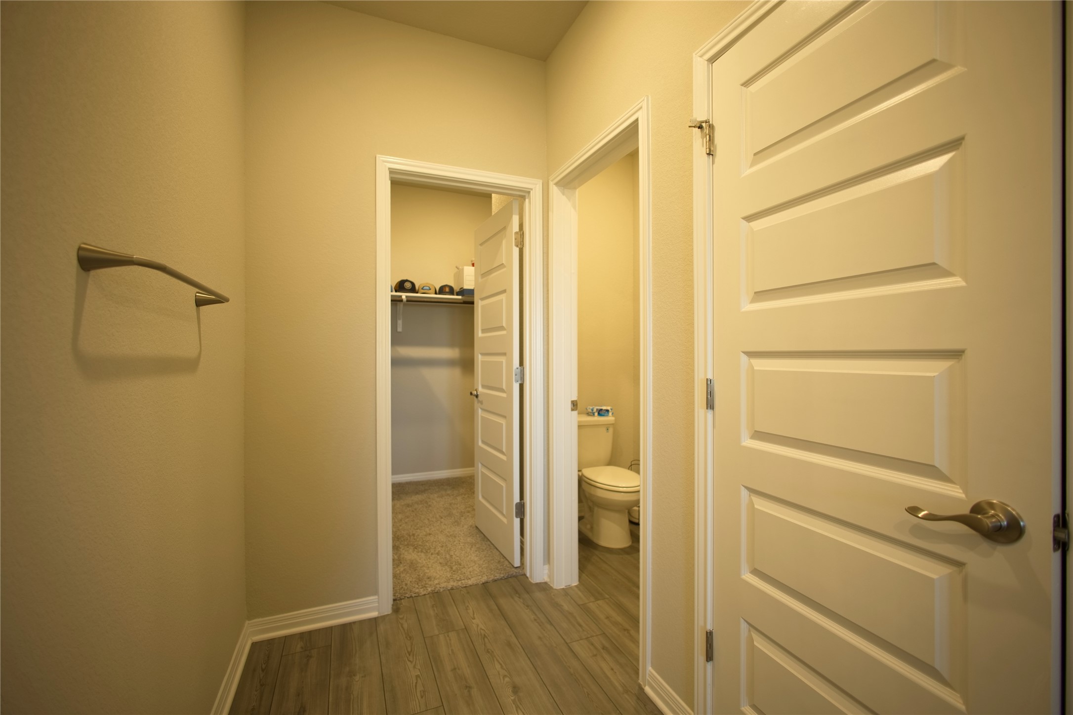 2809 Moyer Lane Round Rock, TX 78665 - Photo 8 of 22 Hall featuring dark wood-style floors and baseboards
