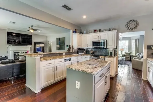 a view of a backyard with furniture and a tub