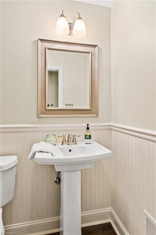 1318 Robinhood Road High Point, NC 27262 - Photo 25 of 43 Updated Half bath off Den area