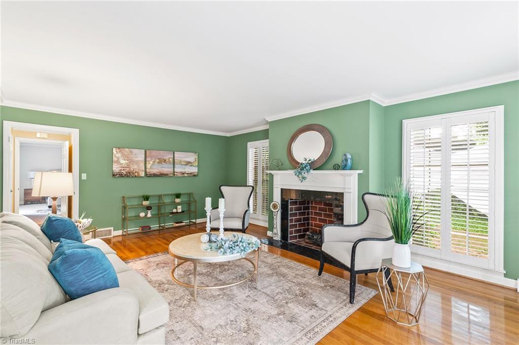 1318 Robinhood Road High Point, NC 27262 - Photo 28 of 43 Lots of space and lots of possibilities for use in this spacious living room!