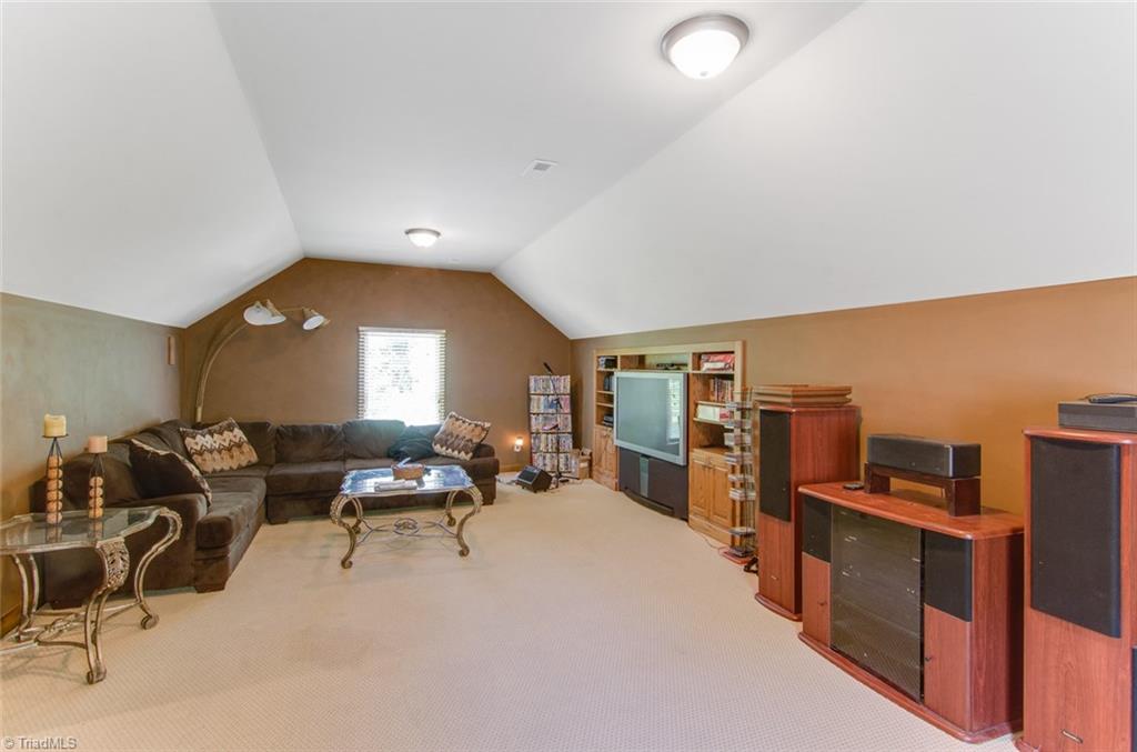 1318 Robinhood Road High Point, NC 27262 - Photo 29 of 43 Upstairs Bonus is HUGE! Perfect entertaining space, Movie room, or Game area! This room has a separate stairway off the kitchen