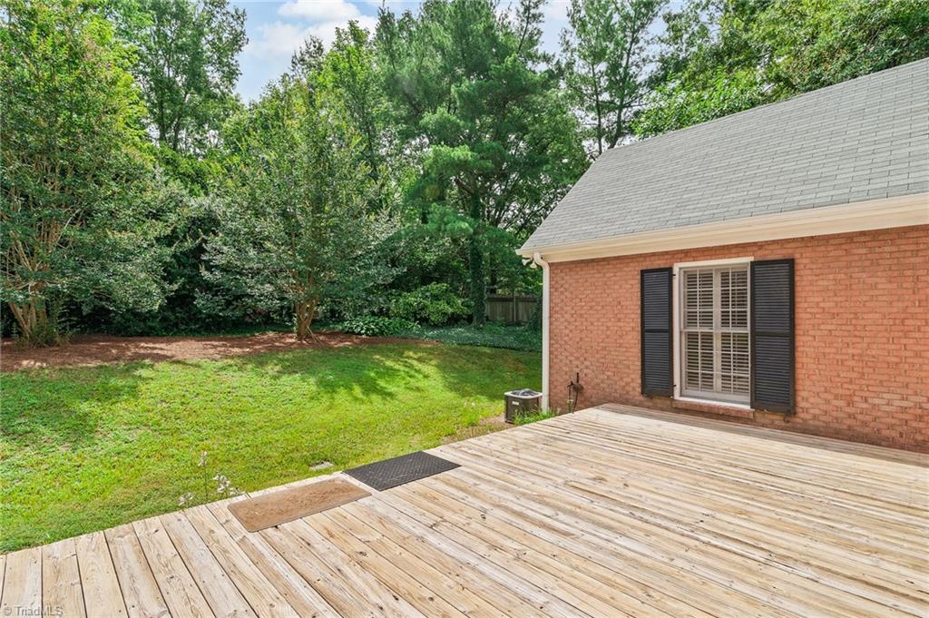 1318 Robinhood Road High Point, NC 27262 - Photo 39 of 43 The area to the right is the main level Master Bedroom with privacy views!
