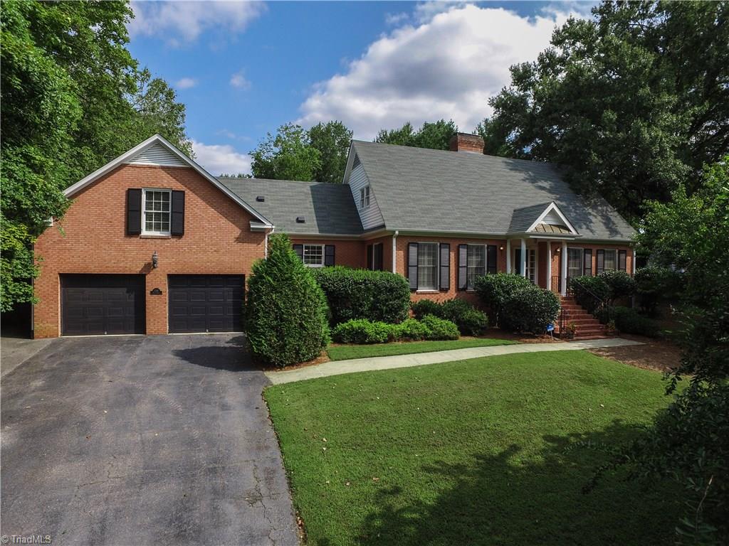 This 4 bedroom home boasts a main level master bedroom, 3 bedrooms up, a Bonus/recreation room PLUS Formal living and Dining, cozy den and "TO DIE for eat in Kitchen/sunroom/sitting area!