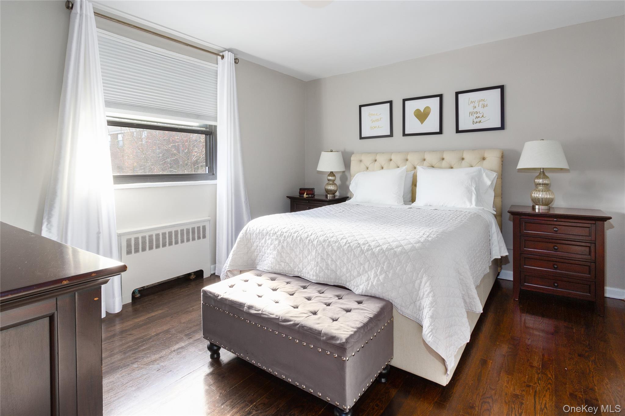 163-62 Willets Point Boulevard, Unit UPPR Queens, NY 11357 - Photo 14 of 19 a bedroom with a bed and a window
