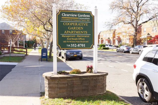 a view of a street with cars