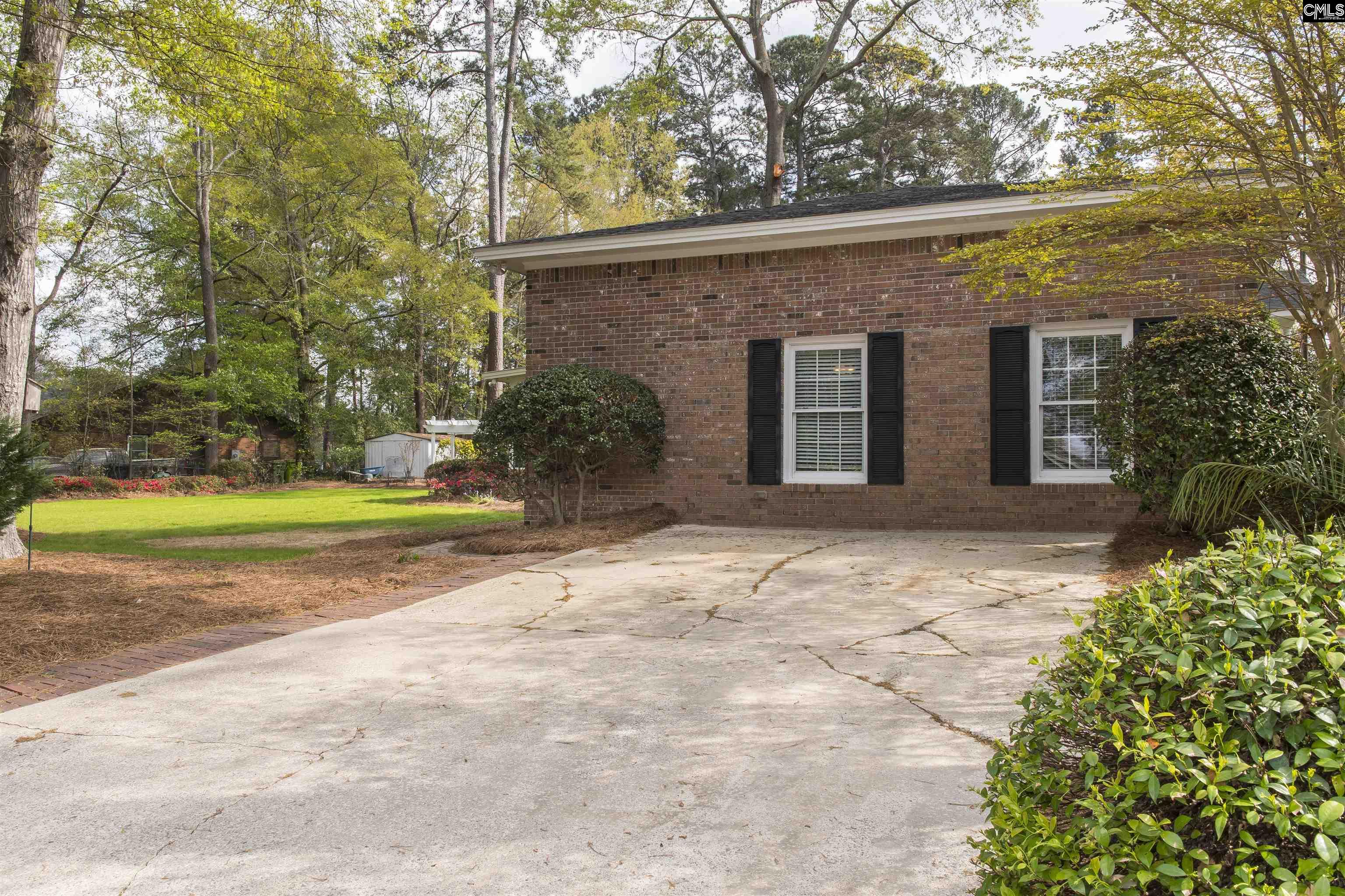 2309 Cunningham Road Columbia, SC 29210 - Photo 7 of 41 a view of a house with a backyard