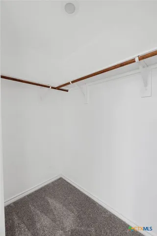 a view of small space with racks on the wall