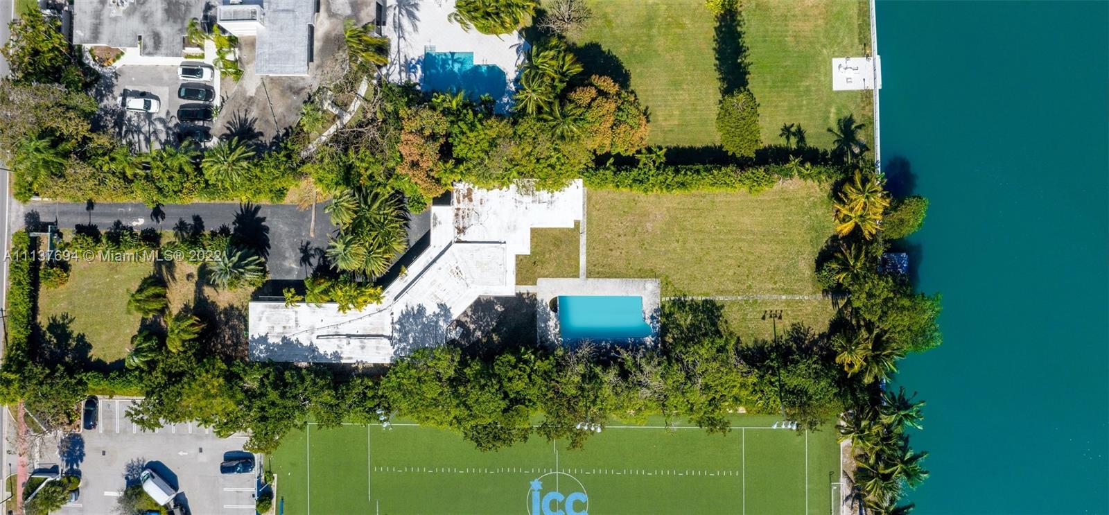 4333 Pine Tree Drive Miami Beach, FL 33140 - Photo 5 of 6 a view of a garden