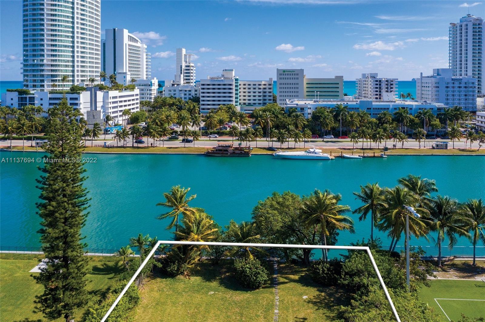 4333 Pine Tree Drive Miami Beach, FL 33140 - Photo 6 of 6 a view of a city with swimming pool