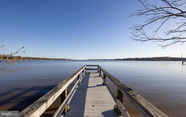 a view of a golf course with a lake view
