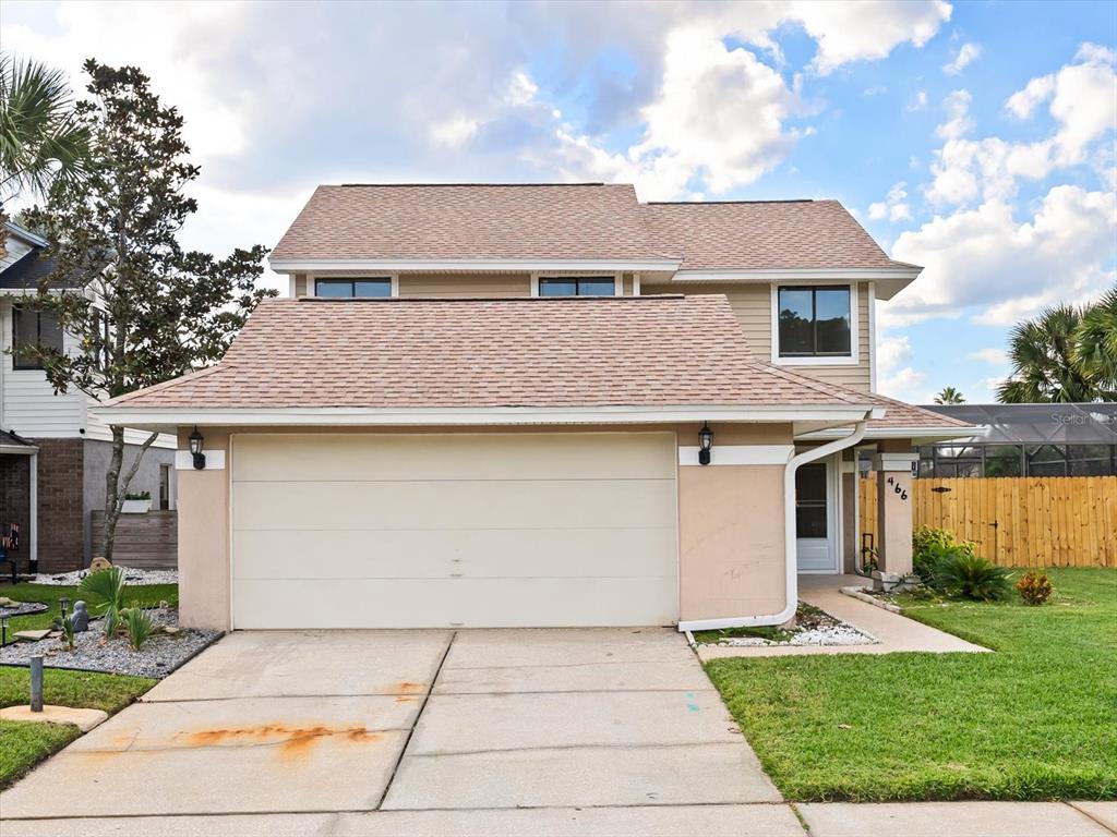 a front view of house with yard