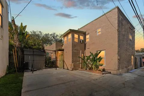 a view of a house with floor and a garage
