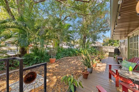 a backyard of a house with seating space