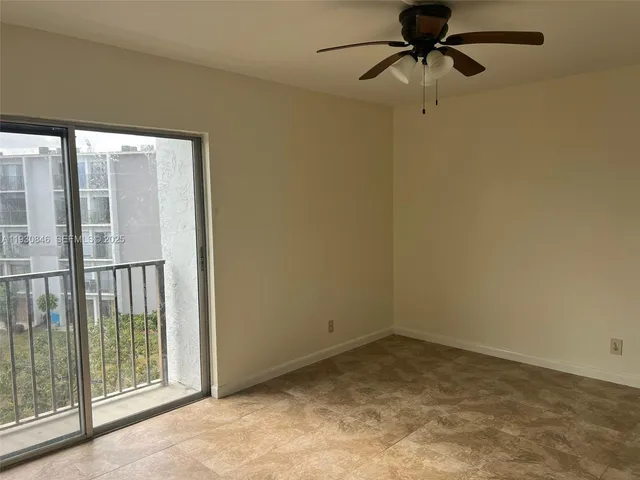 a view of a room with a window