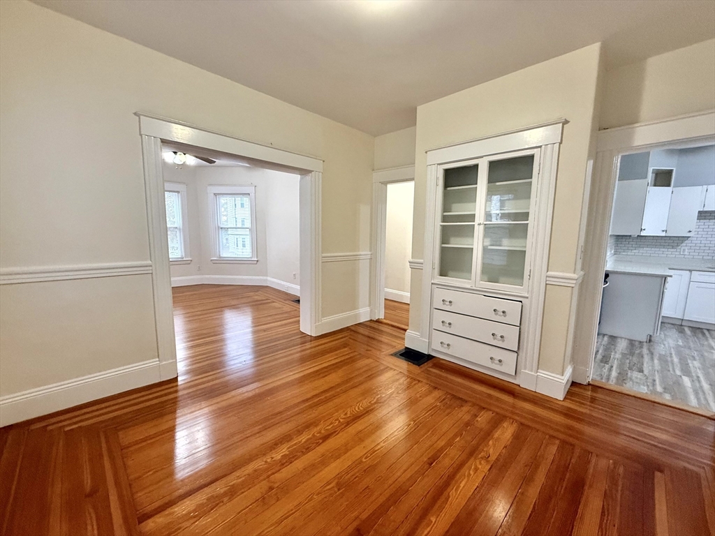 23 Park Road, Unit 23 Belmont, MA 02478 - Photo 5 of 21 a view of a room with wooden floor and windows