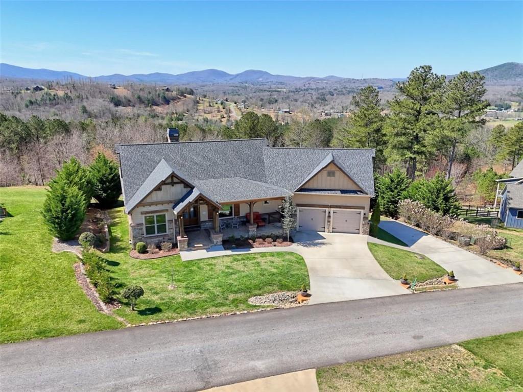 899 Ridge Pointe Way Blairsville, GA 30512 - Photo 86 of 88 an aerial view of a house with a big yard