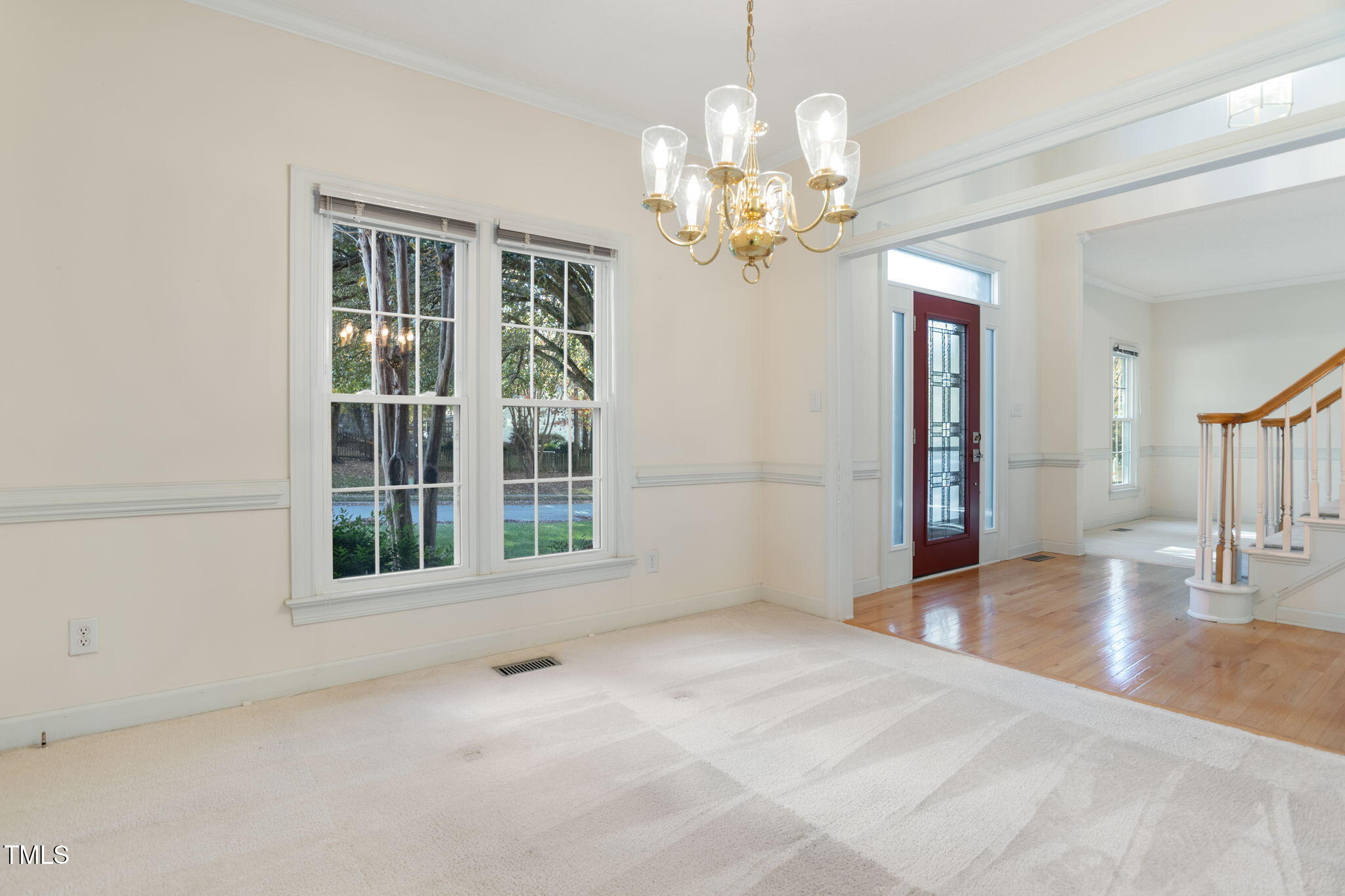 12404 Tappersfield Court Raleigh, NC 27613 - Photo 3 of 46 a view of an empty room with a window